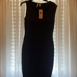 Short sleeve black dress.